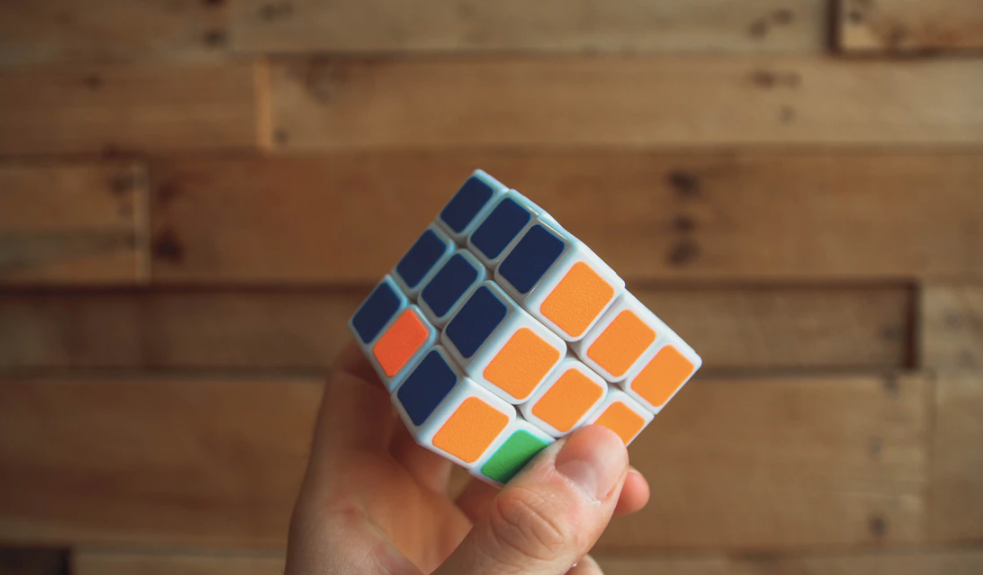 person holding 3x3 Rubik s Cube photo – Free Las vegas Image on Unsplash